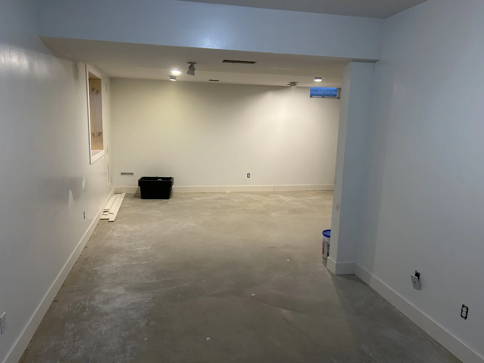 Basement room emptied to bare concrete